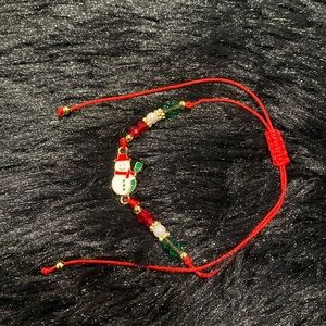 Snowman charm adjustable pull cord bracelet